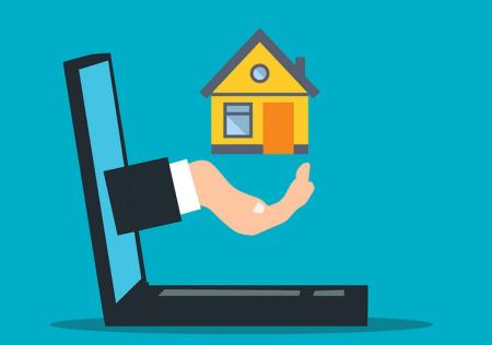 main soutient une maison